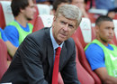 Arsene Wenger watches on from the sidelines