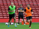 Steven Gerrard watches on at training