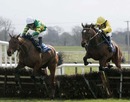 Tony McCoy on Head Of The Posse jump ahead of Ruby Walsh on Cousin Vinny
