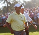 Tiger Woods smiles on the golf course again
