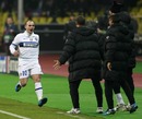 Wesley Sneijder runs off to celebrate with his team-mates