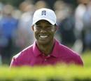 Tiger Woods peers onto the seventh green during his practice round