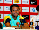 Cesc Fabregas smiles during a press conference