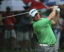 Lee Westwood watches his ball