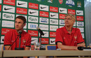 Arsene Wenger and Aaron Ramsey speak to the press