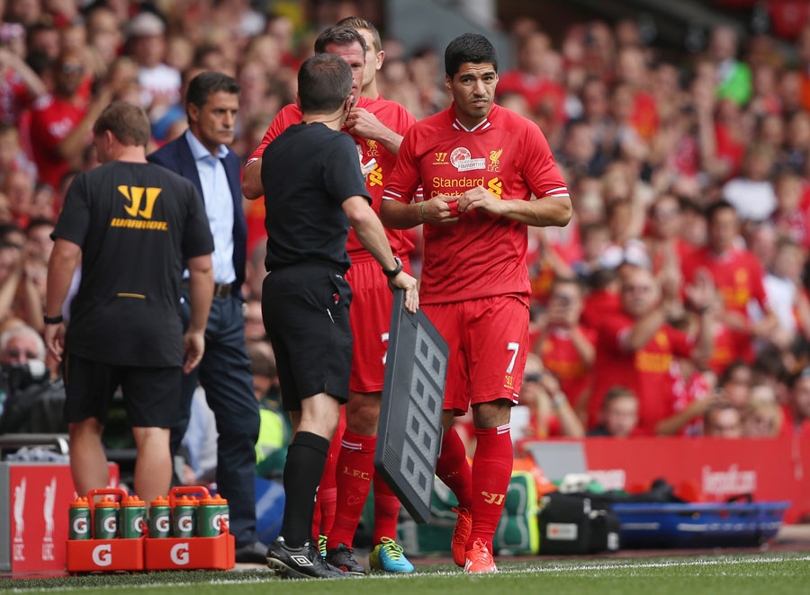 Jamie Carragher and Luis Suarez come off the bench