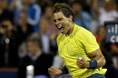 Rafael Nadal celebrates his win over Novak Djokovic