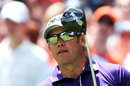 Lee Westwood watches his tee shot at the first