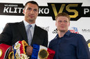 Wladimir Klitschko and Alexander Povetkin pose for a photo after their news conference