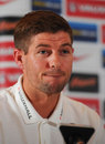 Steven Gerrard looks amused during a press conference