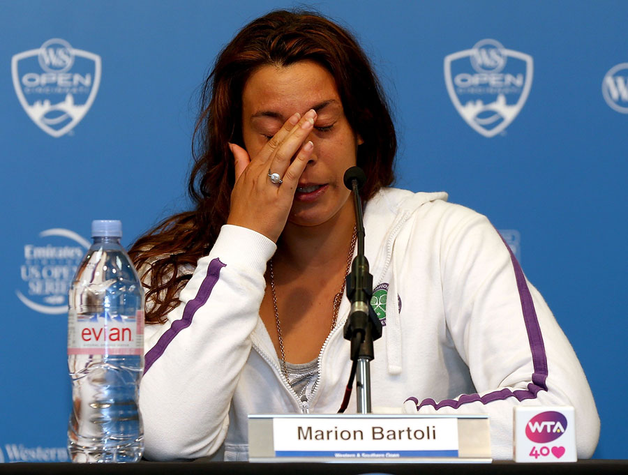 Wimbledon champion Marion Bartoli announces her retirement from professional tennis