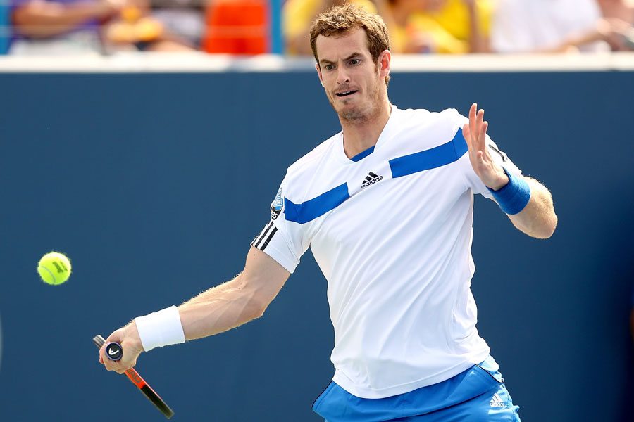 Andy Murray concentrates on a forehand