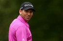 Sergio Garcia walks with a smile on his face