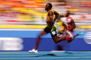Usain Bolt cruises through his 200-metre heat