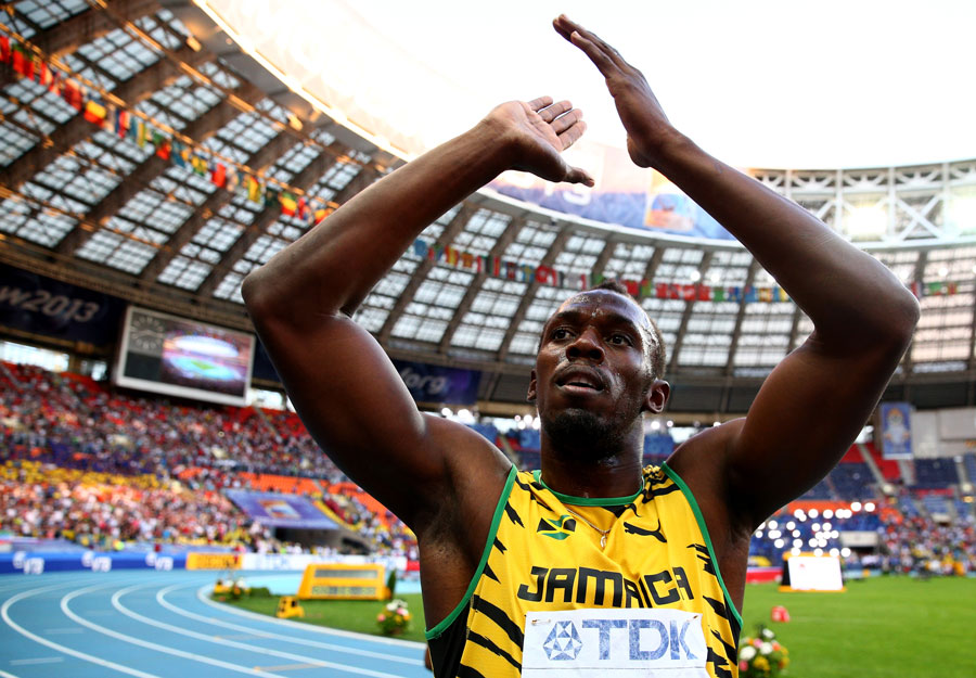 Usain Bolt applauds the Moscow crowd