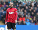 Wayne Rooney looks on