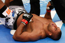 Alistair Overeem lies on the mat after his knockout loss to Travis Browne 