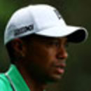 Tiger Woods walks off the third tee