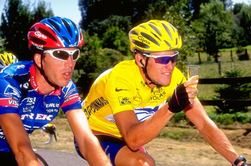 Lance Armstrong toasts his victory