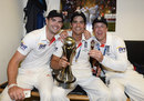 James Anderson, Alastair Cook and Graeme Swann carry on the celebrations in the dressing room