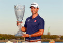 Adam Scott poses with the trophy after winning the first of the FedEx Cup Play-off events