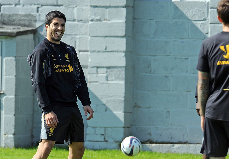 Luis Suarez seems in good spirits at Liverpool training