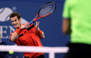 Andy Murray en route to a straight sets win over Michael Llodra