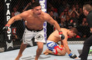 Kelvin Gastelum celebrates after his submission victory over Brian Melancon