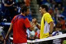 Daniel Evans shakes hands with Tommy Robredo after their third round match