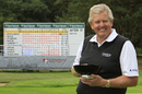 Colin Montgomerie poses with the Senior Masters trophy