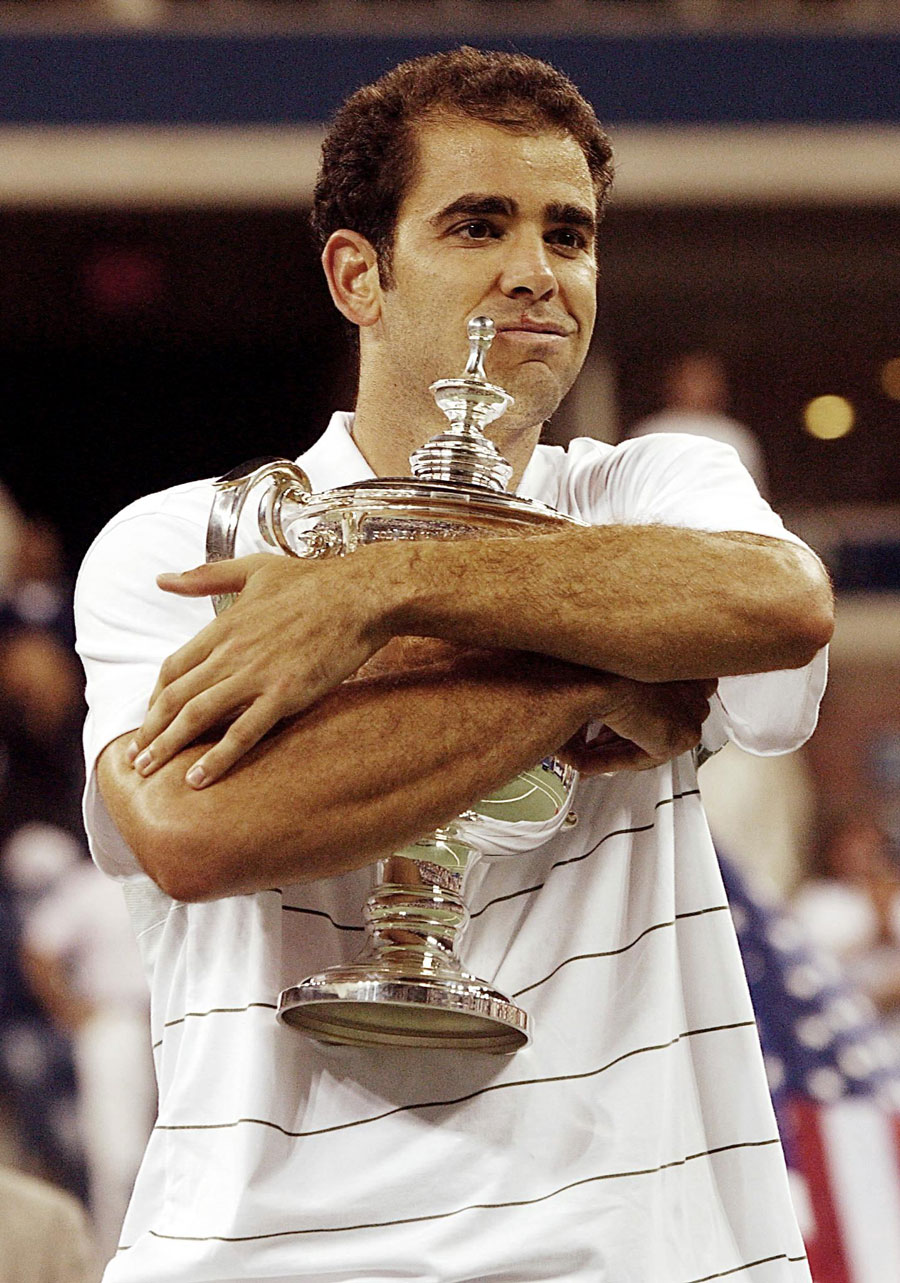 Pete Sampras clutches the US Open trophy