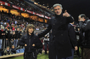 Jose Mourinho walks pitchside with his son