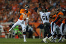 Payton Manning throws one of his record-equaling seven touchdown passes