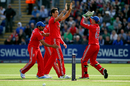 England celebrate the wicket of Michael Clarke