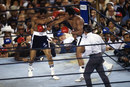 Ken Norton and Muhammad Ali battle in the ring