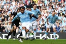 Carlos Tevez scores from the penalty spot