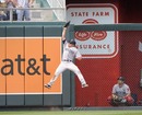 Jacoby Ellsbury leaps to make a catch