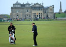 Tim Henman practices in front of the famous Old Course club house at St Andrews