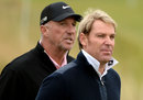 Sir Ian Botham and Shane Warne practice for the Alfred Dunhill Championship