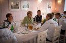German Chancellor Angela Merkel with the German national side at dinner