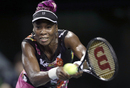 Venus Williams stretches to a backhand