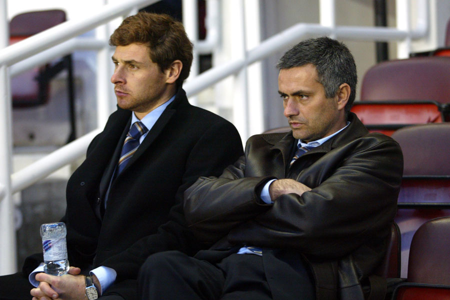 Andre Villas-Boas and Jose Mourinho look on from the bench