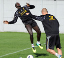 Mamadou Sakho celebrates after winning a game of crossbar challenge during Liverpool training