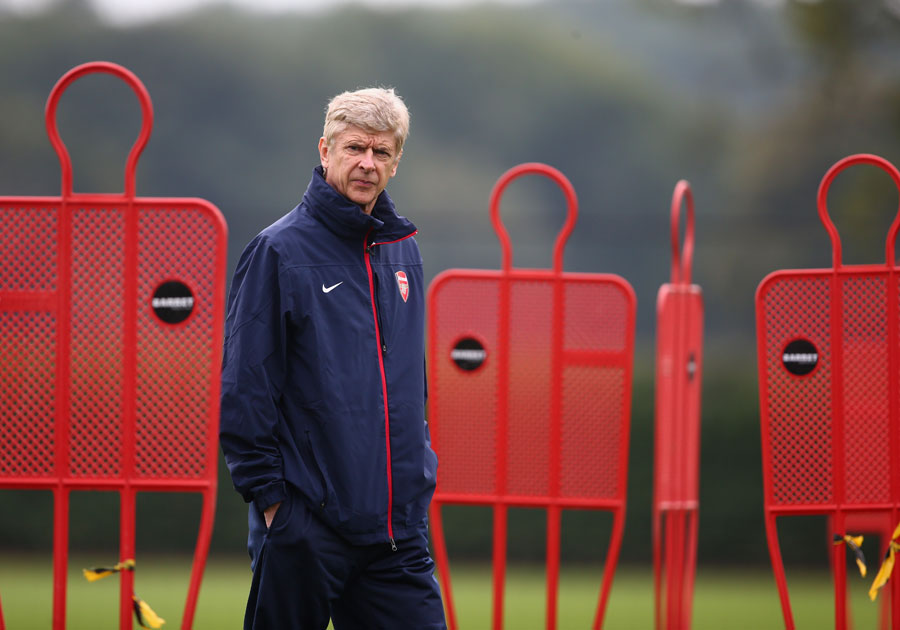 Arsene Wenger during training ahead of a Champions League tie against Napoli