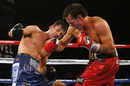 Darren Barker throws a right at Daniel Geale