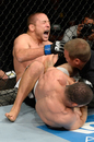 Mike Pierce screams while getting submitted by Rousimar Palhares