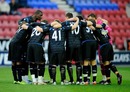 Portsmouth players huddle before the game