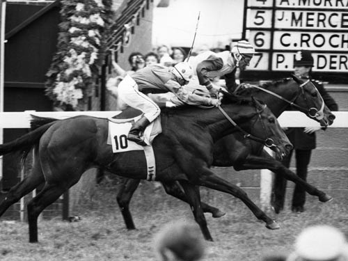 Greville Starkey wins the Derby on Shirley Heights