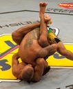 Terry Etim goes for the guillotine against Rafael Dos Anjos