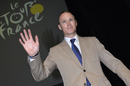 Chris Froome waves at the launch of the 2014 Tour de France route